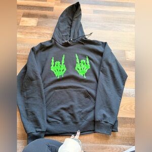 Black Hoodie with Green Skeleton Design